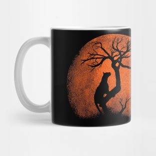 leopard on a tree. the sun Mug